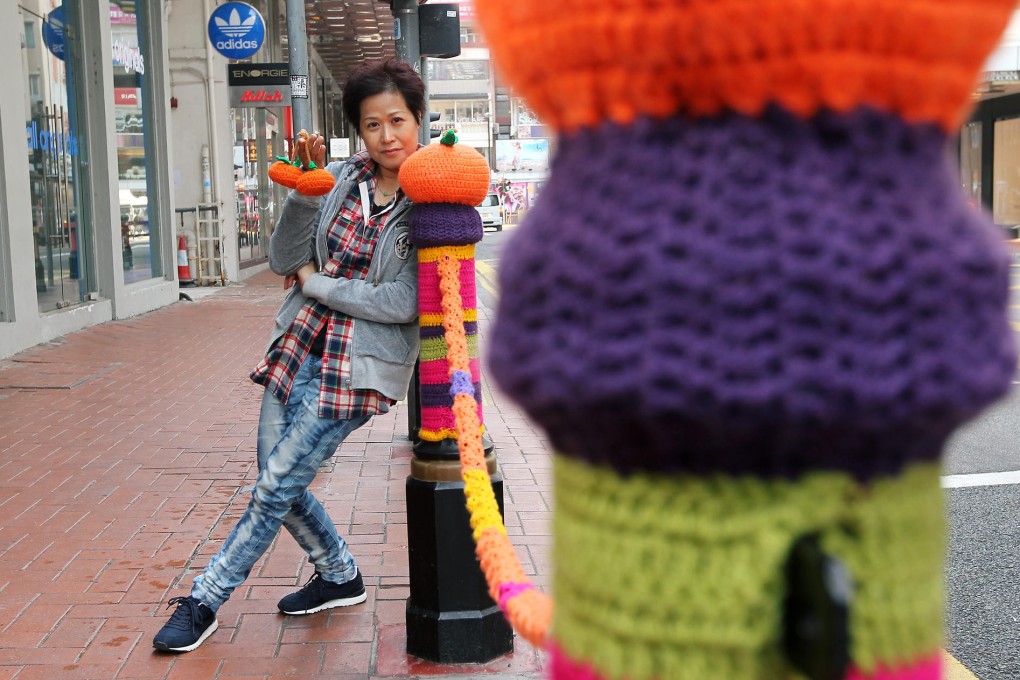 Esther Poon shows off her work in Causeway Bay. Photo: Edmond So