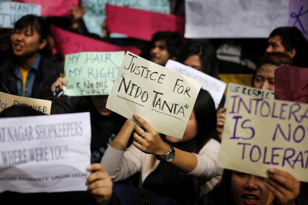 Several hundred people, many of them students shouting demands for justice, protested outside a Delhi police station.