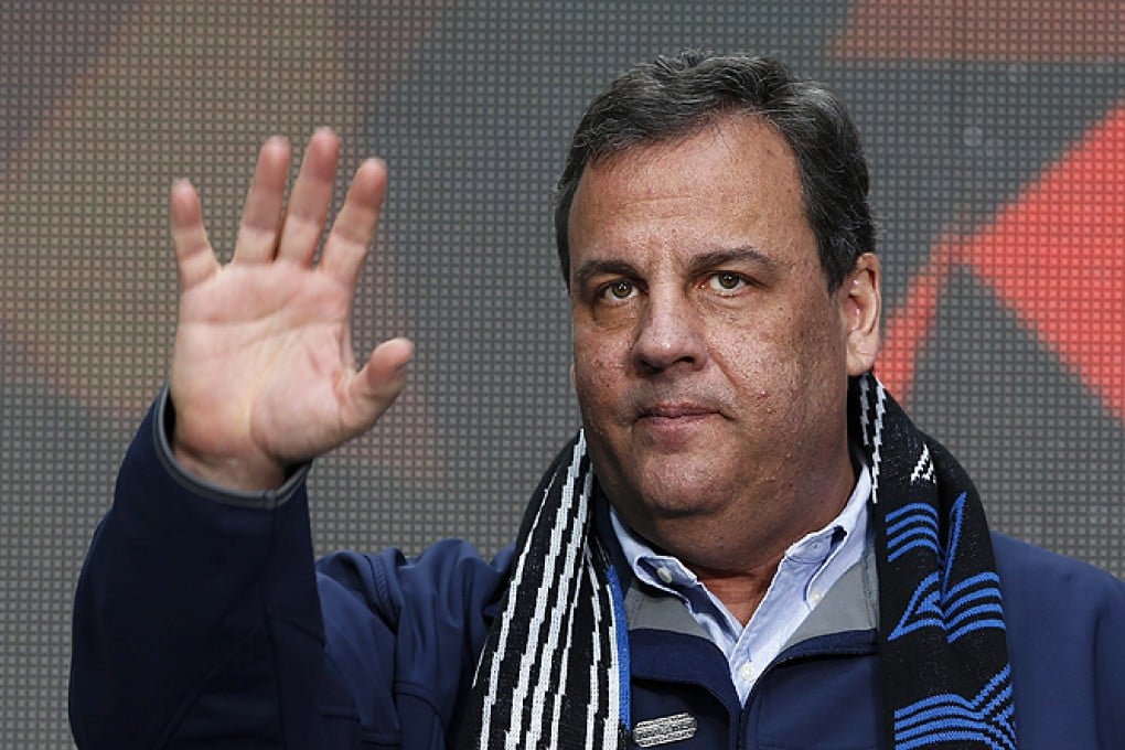 Chris Christie waves to the crowd during a Super Bowl host committee handover ceremony in New York. Photo: EPA