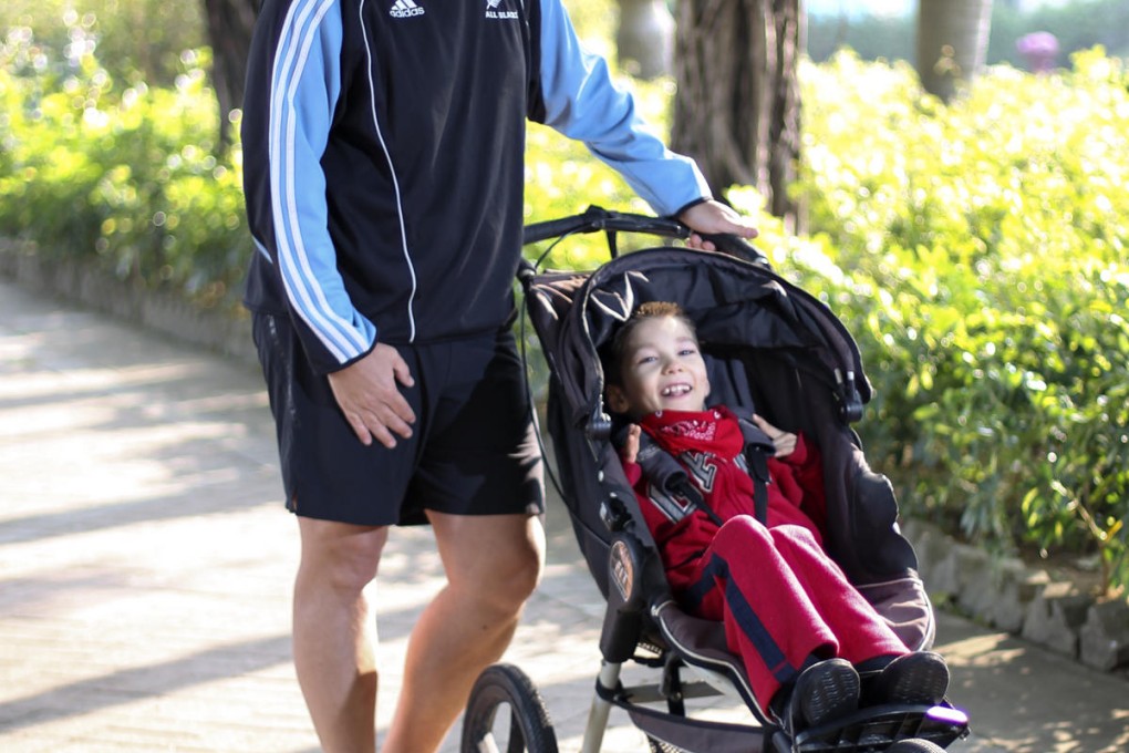Richard Smits with son Thomas.Photo: Nora Tam