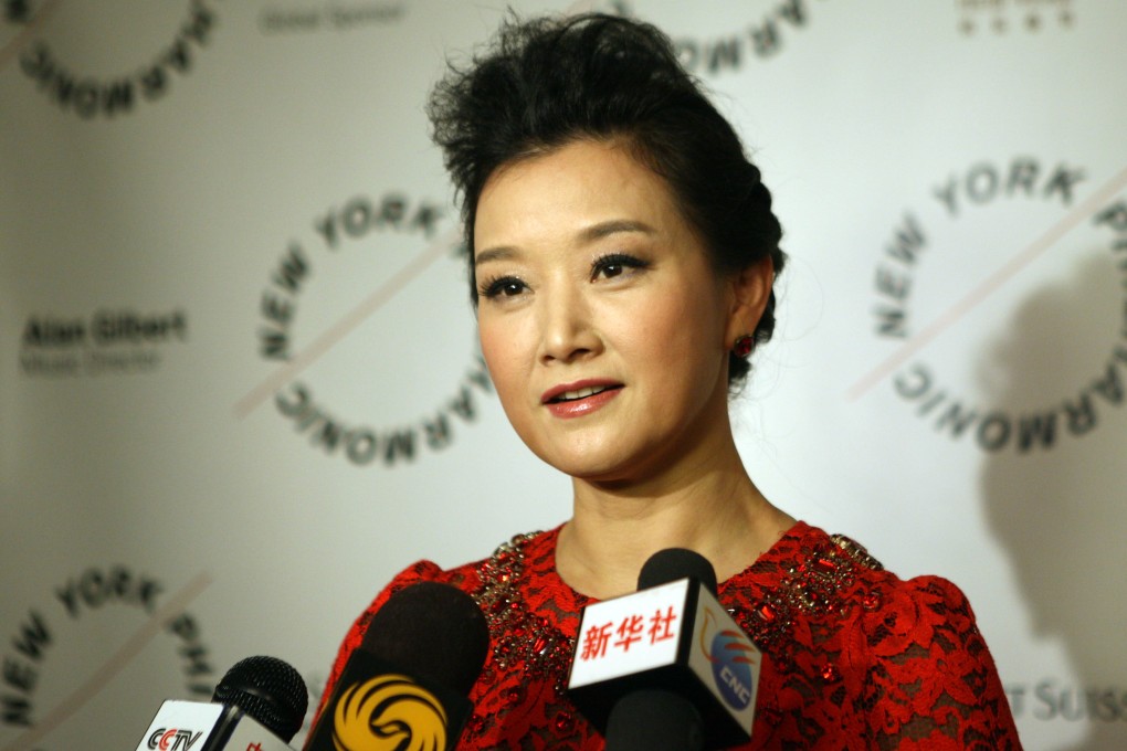 Chinese singer Song Zuying talks to the press after the Chinese New Year concert by the New York Philharmonic orchestra. Photo: Xinhua