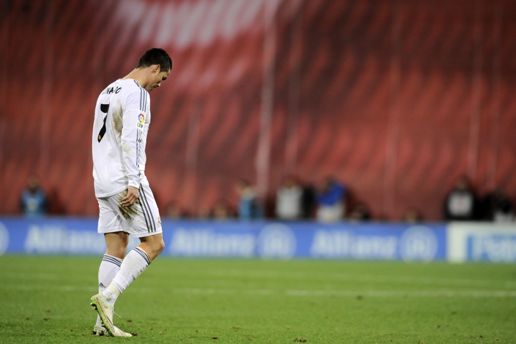 Ronaldo trudges off after being dismissed. Photo: AP