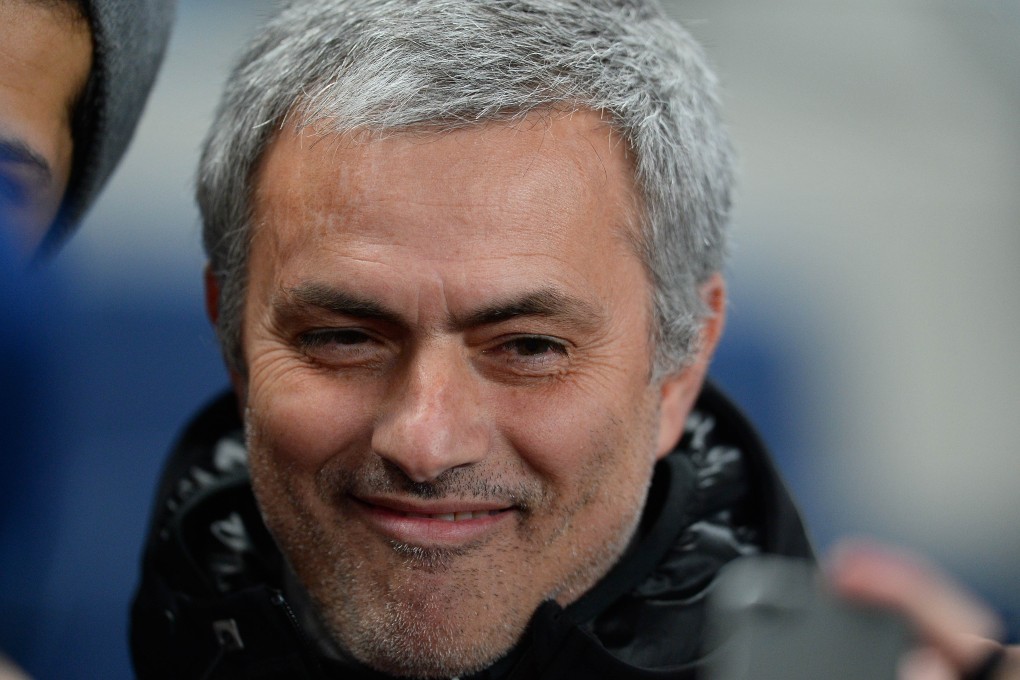 Mourinho smiles before the match, and he was certainly smiling after. Photo: AFP