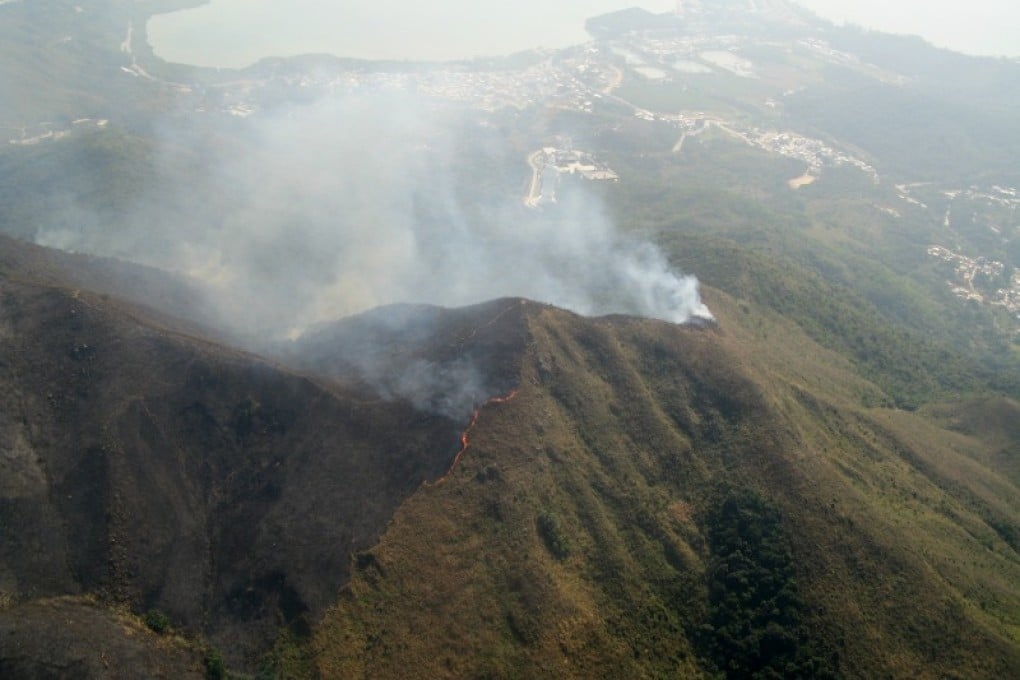 Aerial views of the blaze by day. Photo: Government Flying Service