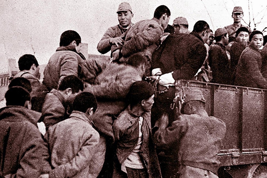 Japanese soldiers herd civilians in Nanking in 1937. Photo: Xinhua