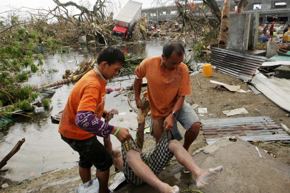 More than 100 died and nearly 800,000 were displaced when Typhoon Haiyan devastated the Philippines last November. Photo: EPA