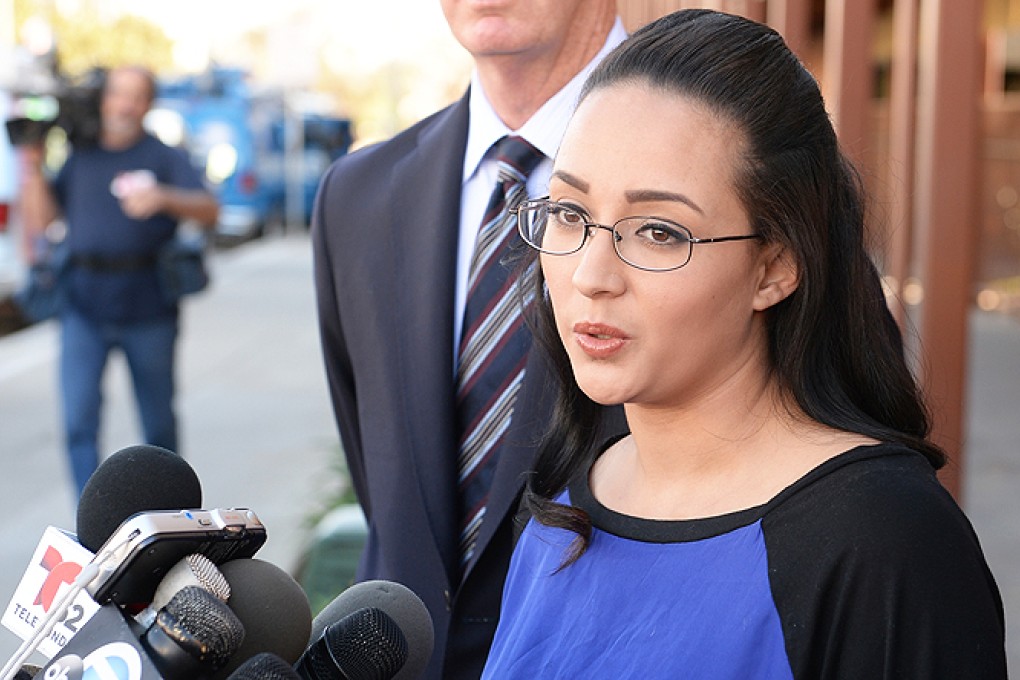 A woman identified as Jamie speaks at a news conference in front of Alhambra High School in Alhambra, California, where Andrea Cardosa last worked as vice principal of student services. Photo: AP