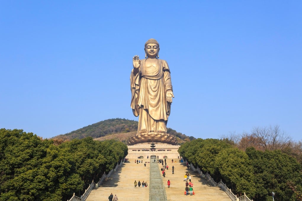 Tourists visit the popular Lingshan Grand Buddha at Wuxi, Jiangsu province, which stands 88 metres high. Photo: Shutterstock