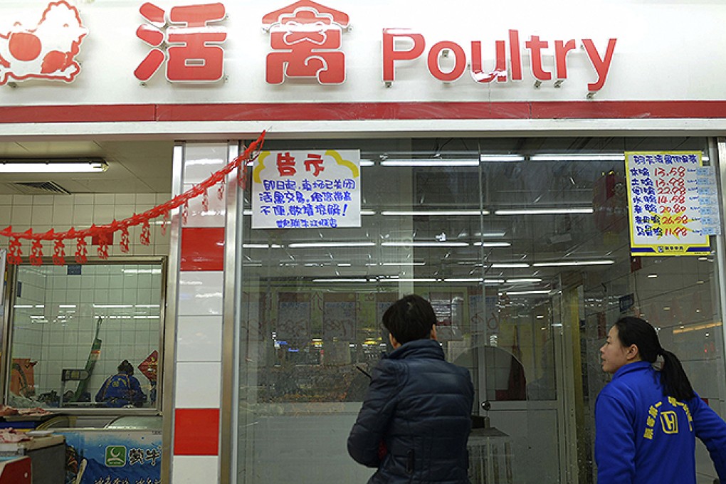 An empty poultry shop at a market in Hangzhou, Zhejiang province. Photo: AP