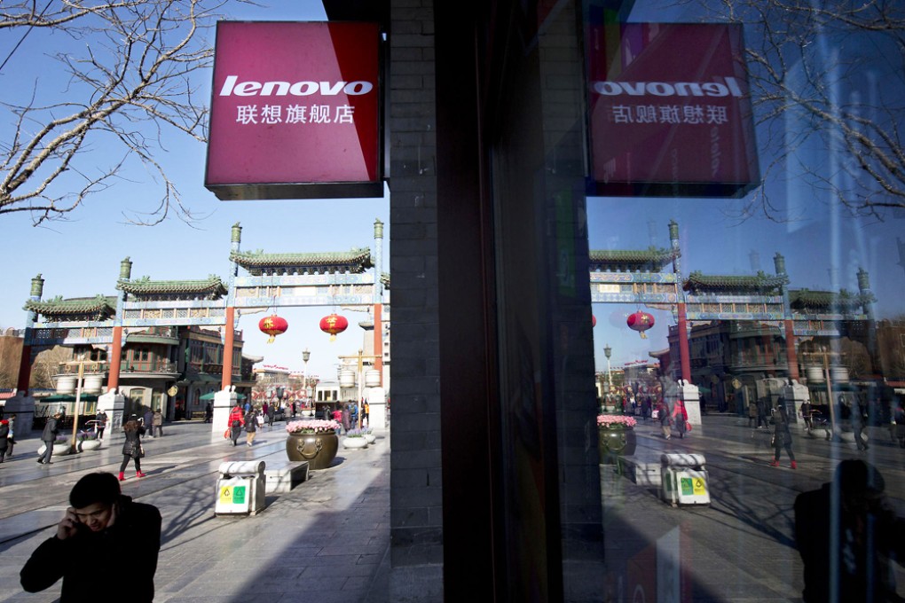 Lenovo's acquisition of Google's Motorola Mobility mobile-phone unit is seen by analysts as weighing on the company's earnings. Photo: AP