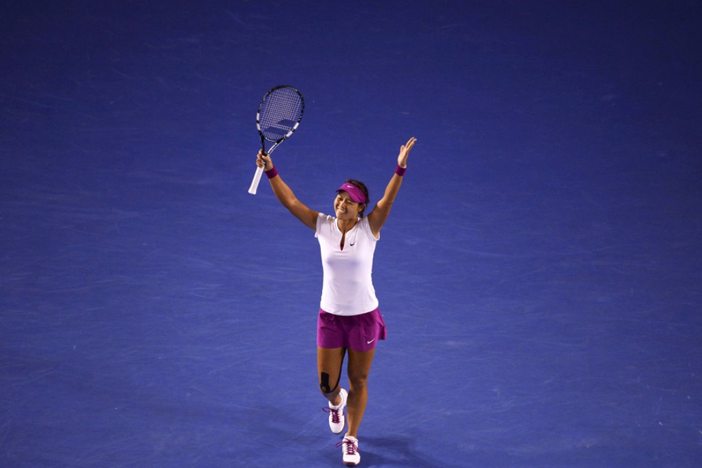 Li Na celebrates after beating Dominika Cibulkova to win the women's final at the Australian Open in Melbourne. Photo: AFP