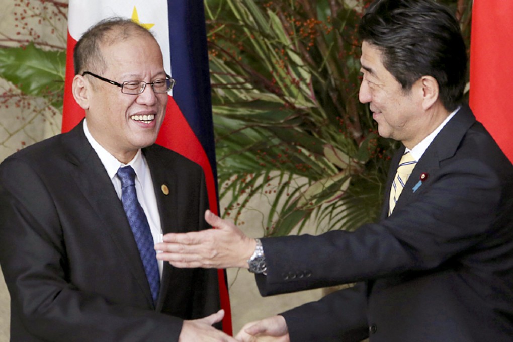 Benigno Aquino meets Shinzo Abe at the Japanese prime minister's residence in Tokyo. Photo: Reuters