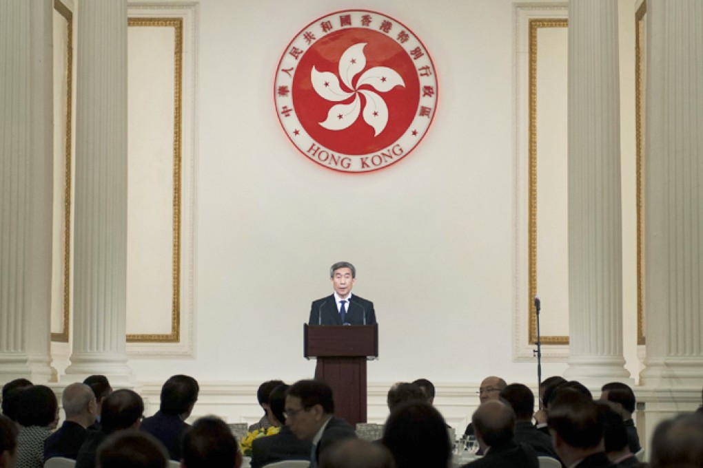 Basic Law Committee chairman Li Fei addresses officials at a Government House lunch. Photo: Sam Tsang