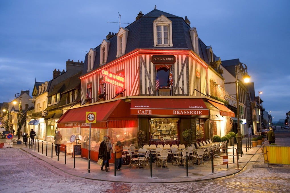 A cafe in the seaside resort town. Photos: AFP; Chanel; Corbis; Alamy
