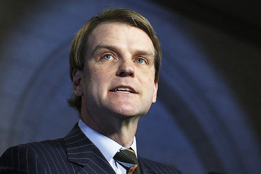 Canada's Immigration Minister Alexander speaks in the foyer of the House of Commons on Parliament Hill in Ottawa. Photo: Reuters