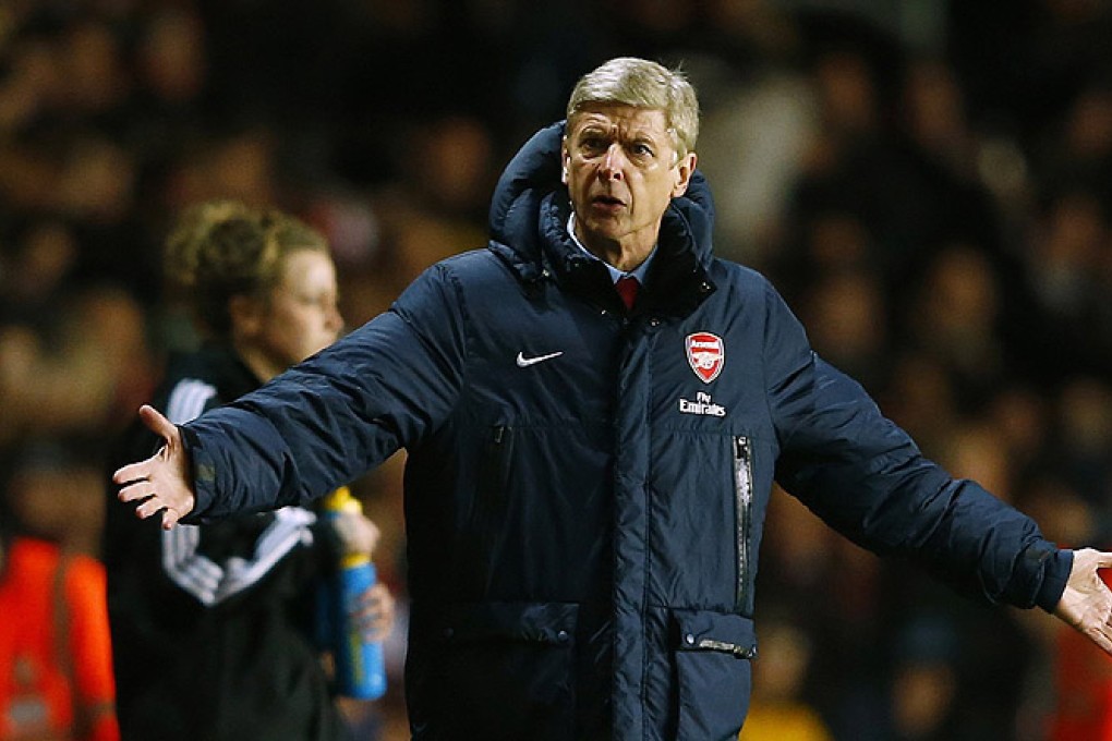 Manager Arsene Wenger reacts to the news Arsenal are China's top team. Photo: Reuters