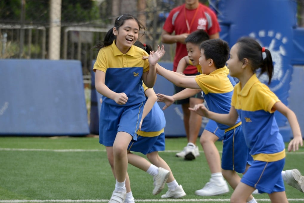 Enthusiastic young players take part in a recent Po Leung Kuk Rugby Fun Day. Photos: HKRFU