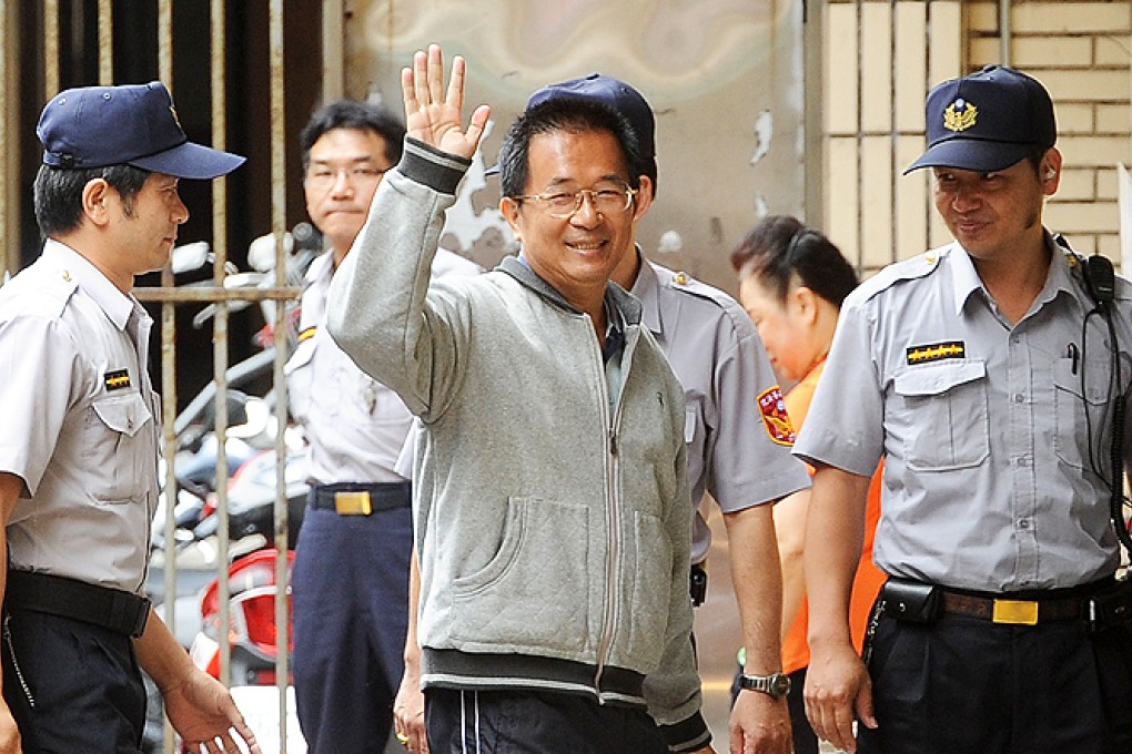 Taiwan has been rocked by a string of corruption scandals involving top officials in recent years, including former president Chen Shui-bian (centre) who is currently serving a 20-year jail term on multiple graft convictions. Photo: AFP