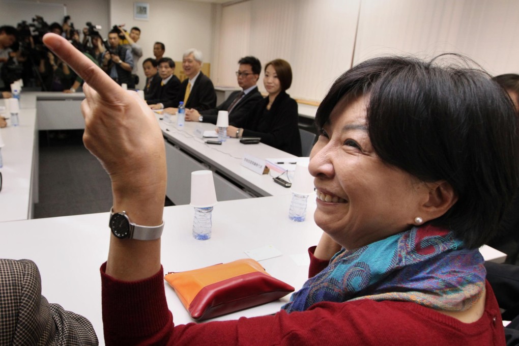 Lawmaker Ann Chiang makes a point during negotiations at the Travel Industry Council offices yesterday. Photo: Sam Tsang