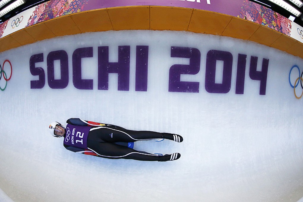 Germany's Tatjana Huefner speeds down the track during the women's singles luge training session. Photo: Reuters