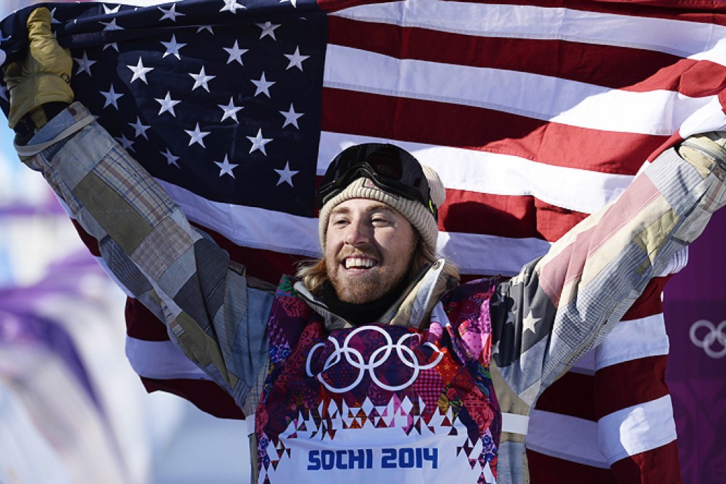 Sage Kotsenburg celebrates winning the Game's first gold medal. Photo: AFP