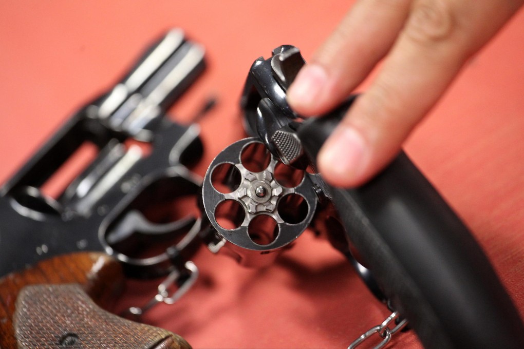 Some of the guns carried by special Independent Commission Against Corruption officers are displayed at a preview of the open days. In 40 years, no ICAC officer has had to fire a weapon. Photo: Felix Wong