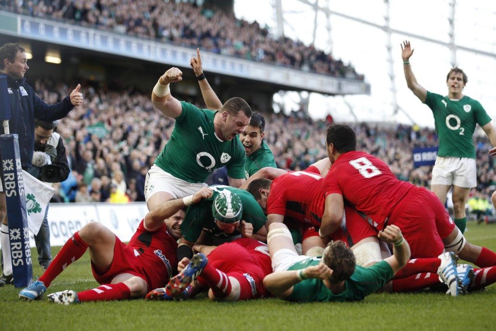 Ireland celebrate Chris Henry's try against Wales during their Six Nations match in Dublin on Saturday. Photo: AP