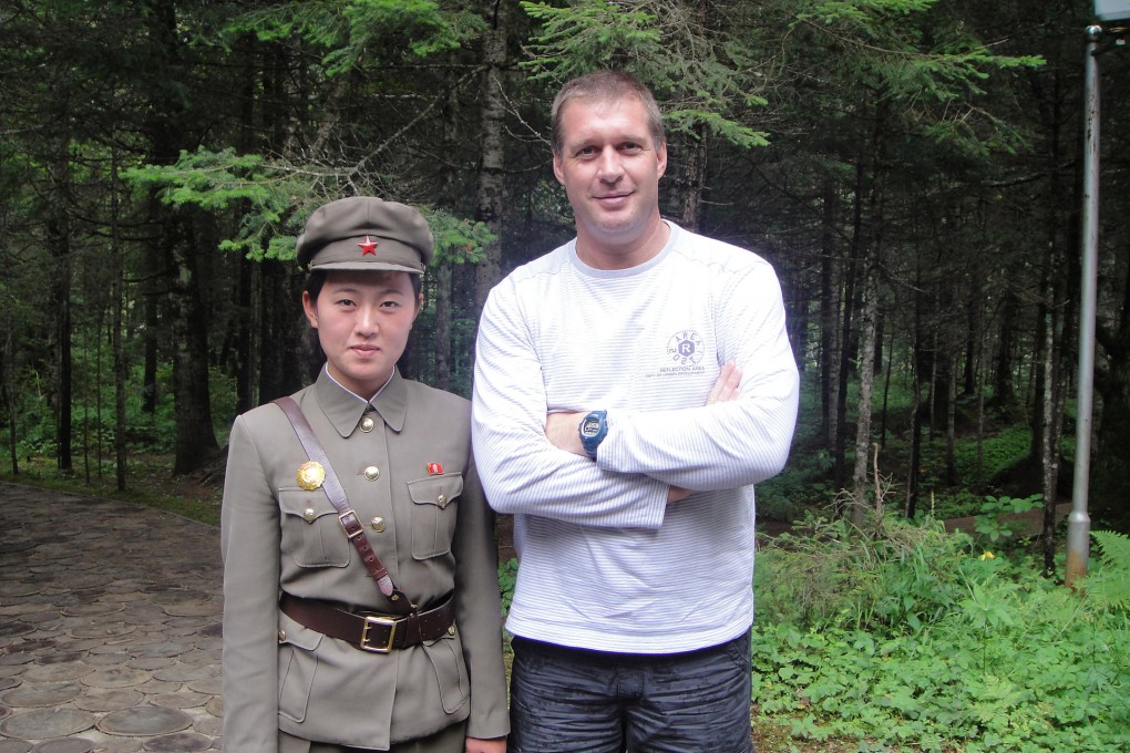 Teacher Ronny Mintjens with a female officer of the North Korean army at a secret military camp. Photo: Ronny Mintjens