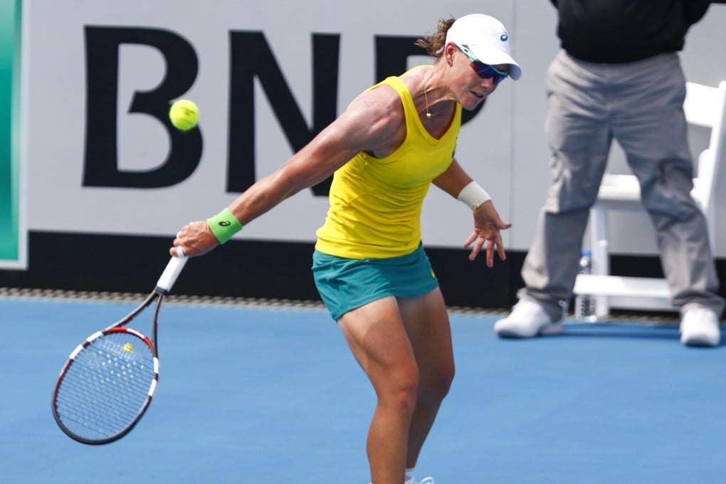 Australian Samantha Stosur returns the ball to Russian Victoria Kan during their Fed Cup tie in Hobart. Photo: EPA