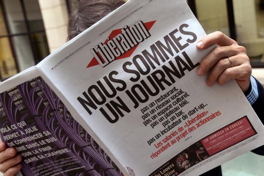 Liberation journalists vented their opposition on the cover of the weekend edition on February 9, 2014. Photo: AFP