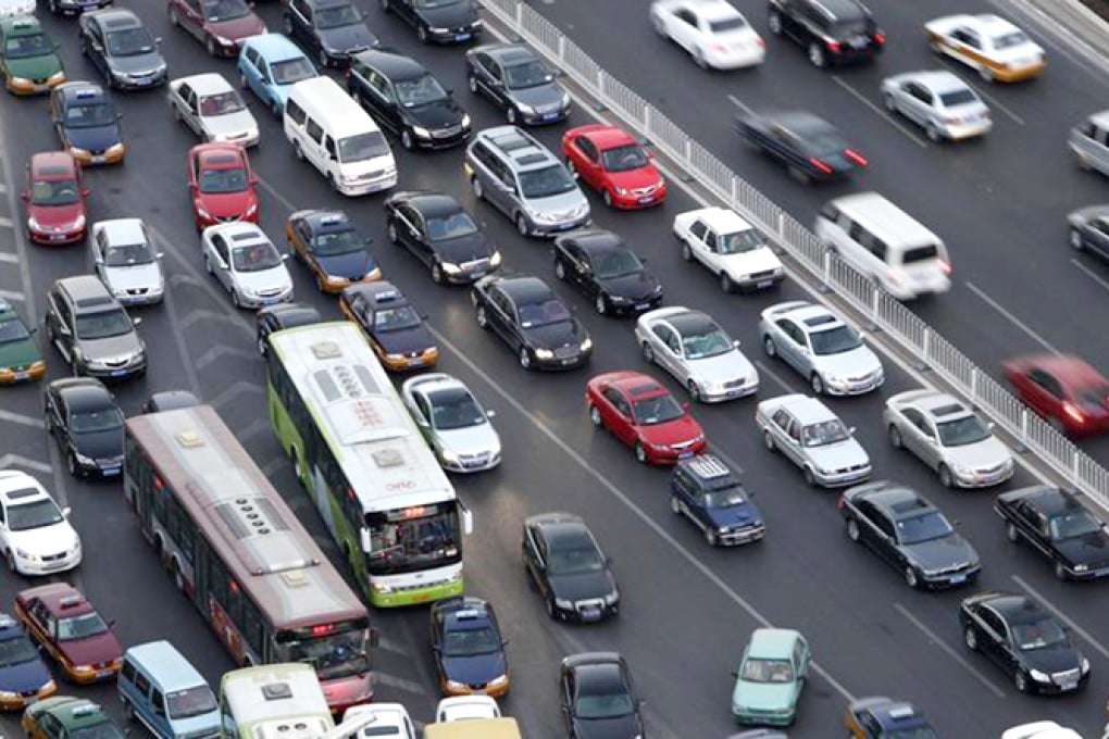 Vehicles in a traffic jam in central Beijing. Less than one out of a thousand new car owners in Beijing is opting for an electric car. Photo: Reuters