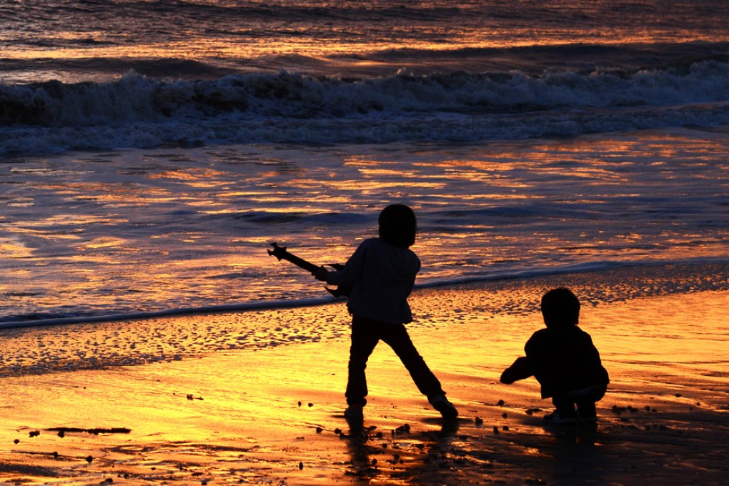 Sunset Beach in California. Research shows that accelerating trade winds in central and eastern areas of the Pacific have driven warm surface water to the ocean's depths, reducing the amount of heat that flows into the atmosphere. Photo: EPA