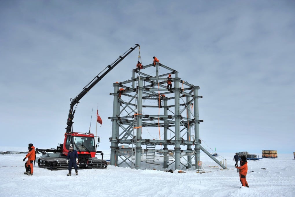Workers top the major steel structure of the Taishan Station, China's fourth research station in Antarctica. Photo: Xinhua