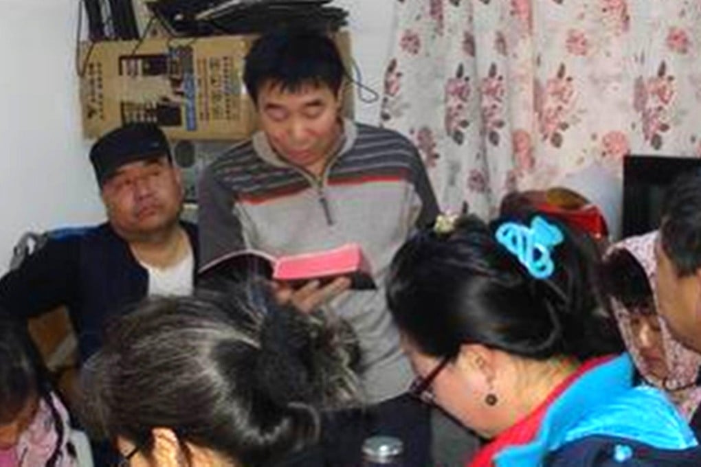 Christian activist Xu Yonghai (centre). Photo: SCMP