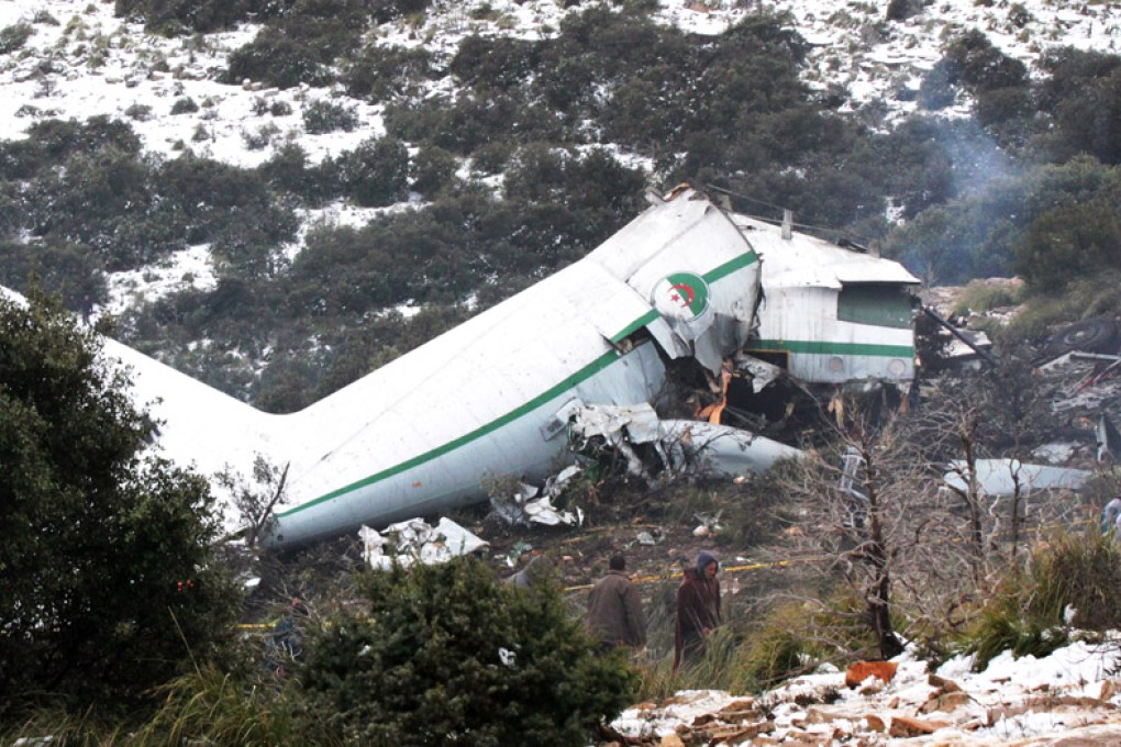 A section of a crashed military plane in a field about 500 kilometres from Algiers, Algeria. The aircraft crashed on Tuesday, leaving just one survivor in one of the country’s deadliest air disasters, the defence ministry said. Photo: EPA