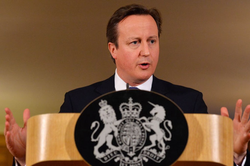 Prime Minister David Cameron addresses a press conference on Britain's floods at 10 Downing Street in London on Tuesday. Photo: AFP