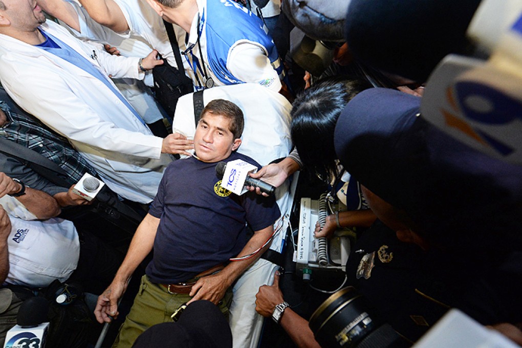 Salvadorean castaway Jose Salvador Alvarenga is surrounded by journalists in an ambulance on his way to San Rafael hospital in Santa Tecla, El Salvador on Tuesday. Photo: AFP