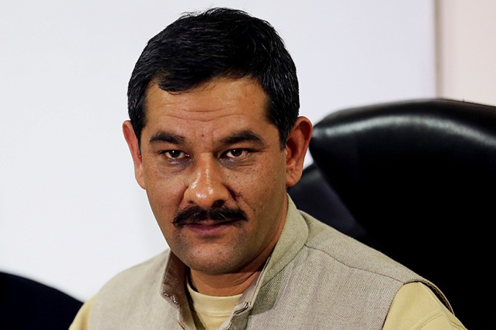 Jitendra Singh, Minister of State for Youth Affairs and Sports, speaks during a press conference in New Delhi, India, on Tuesday. Photo: EPA
