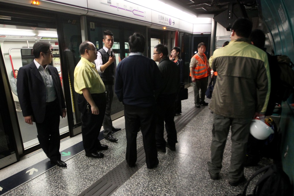 Maintenance workers at the platform of Quarry Bay MTR station after it was reported that sparks appeared in the tunnel between Quarry Bay and Yau Tong on February 4.