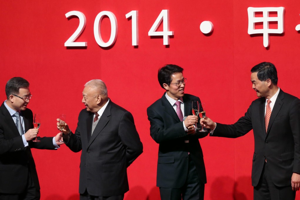 Song Zhe, Commissioner of the Ministry of Foreign Affairs, Tung Chee-hwa, Vice-Chairman of the Chinese People's Political Consultative Conference National Committee, liaison office director Zhang Xiaoming and Chief Executive Leung Chun-ying toast each other. Photo: K Y Cheng