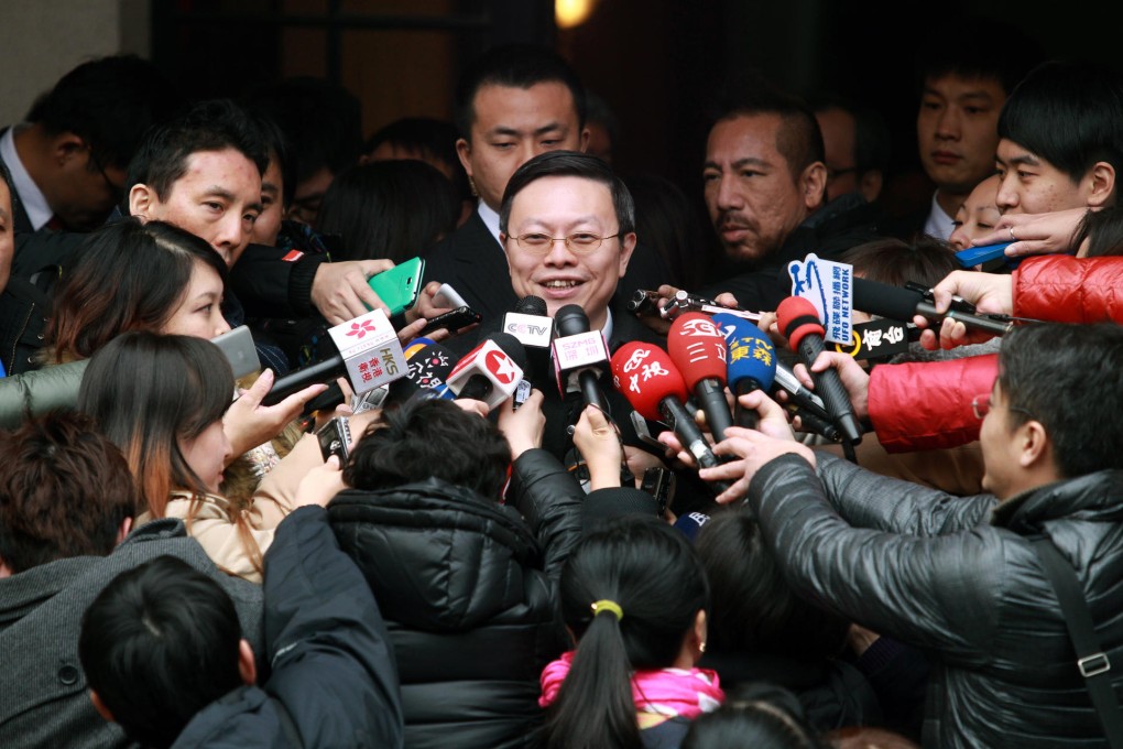Taiwan's Mainland Affairs Council Minister Wang Yu-chi emerges from the Shanghai Academy of Social Sciences. Photo: Simon Song