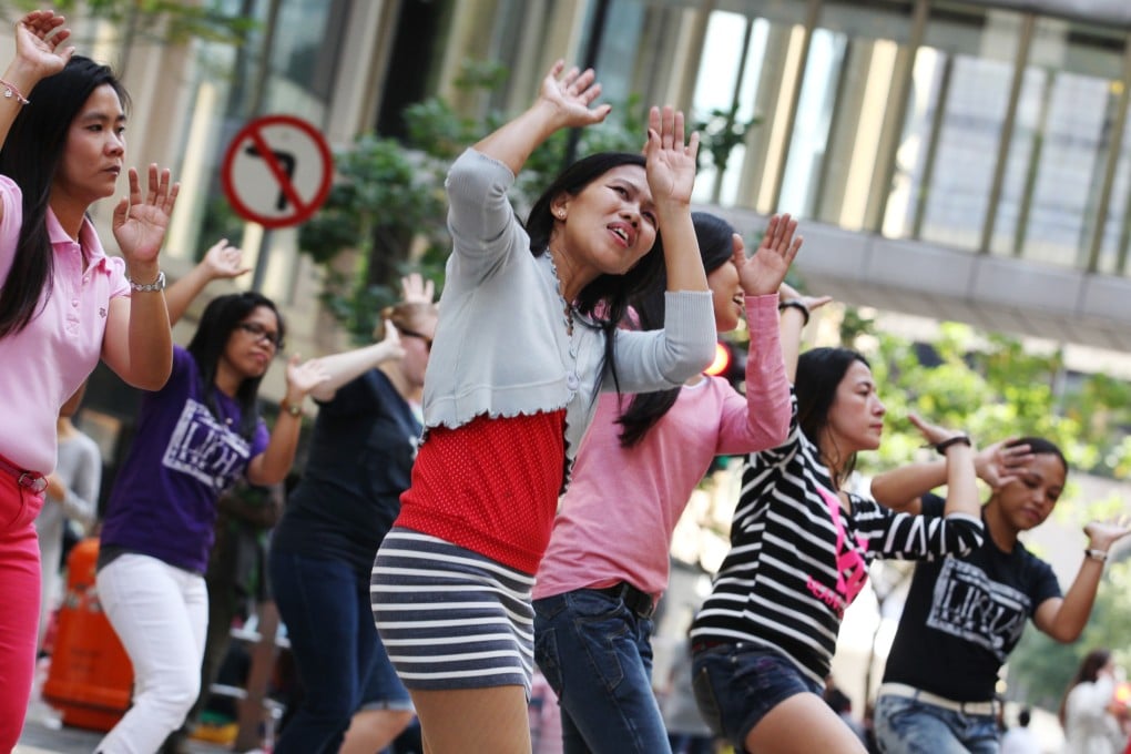 Filipino maids gather on Sunday in Hong Kong. Photo: Nora Tam/SCMP