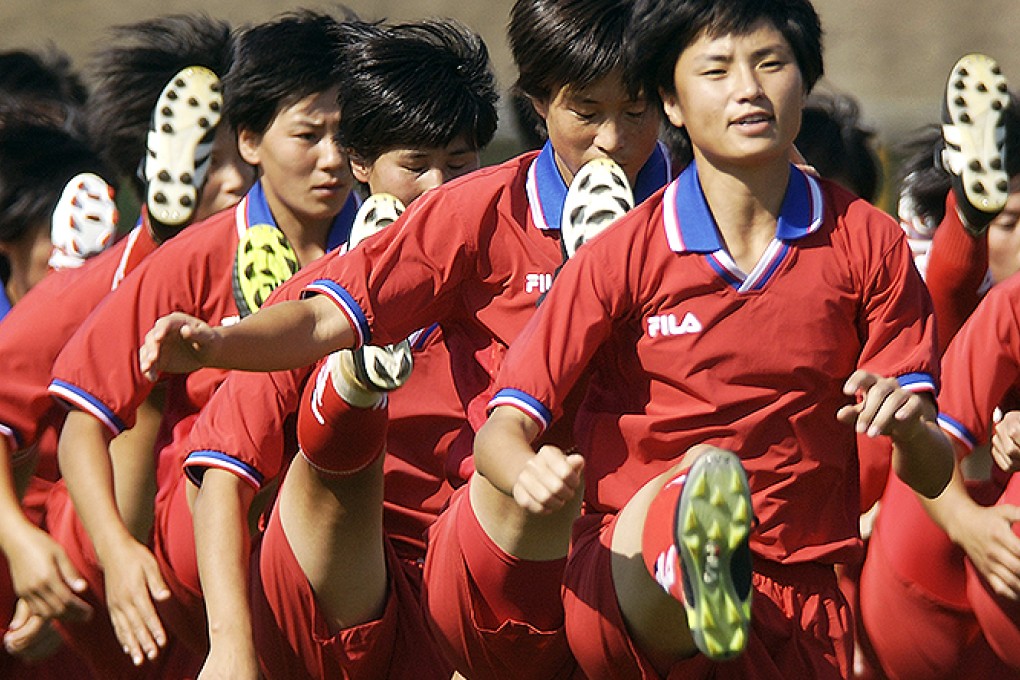 The North Korean squad sticking to strict workout routines. Photo: Reuters