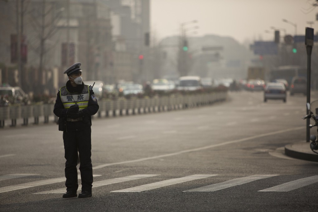 Pollution in Shanghai. China has announced a US$1.6 billion air pollution fund to reward cities and regions that make significant progress in controlling air pollution. Photo: Reuters