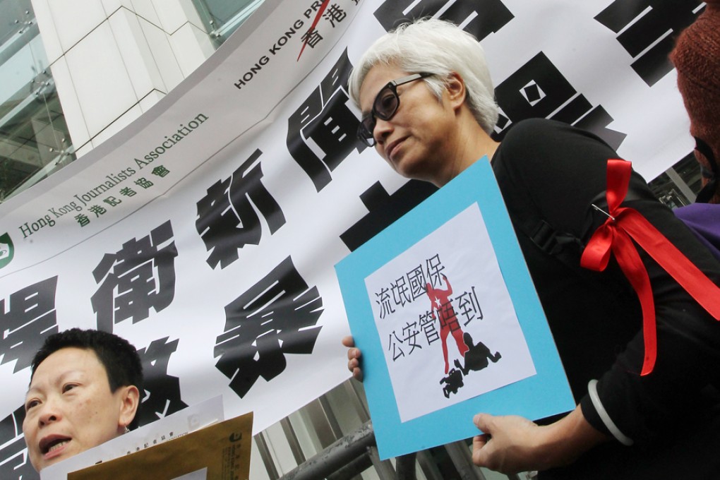 Members of The Hong Kong Journalists Association and the Hong Kong Press Photographers Association march to Liaison Office to the Central People's Government in the Hong Kong to condemn the attacks on Hong Kong Journalists in Beijing. Photo: K. Y. Cheng