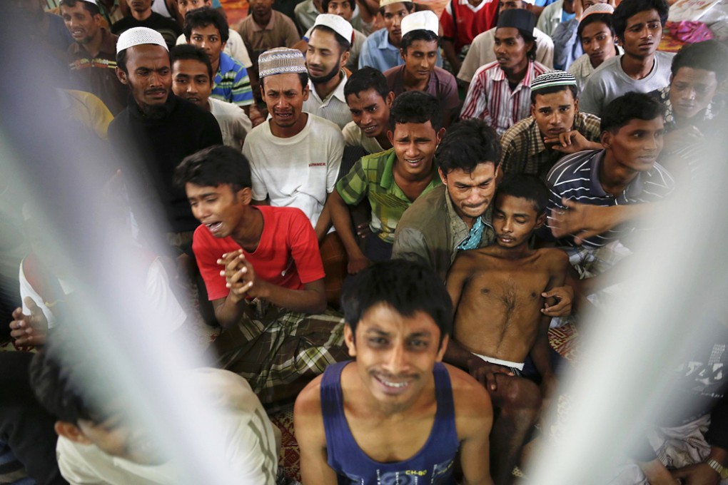 Rohingya people from Myanmar, who were rescued from human traffickers, kept near Thailand's border with Malaysia. Photo: Reuters