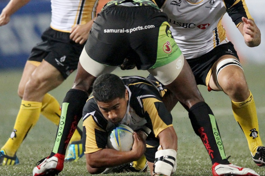 Penguins’ Mike Lealava’a in action during the GFI HKFC Tens cup final against Samurai. Photo: Sam Tsang/SCMP