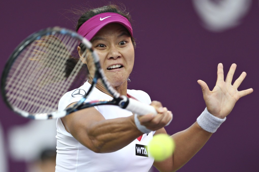 Li Na tumbled out in a topsy-turvy contest. Photo: Reuters