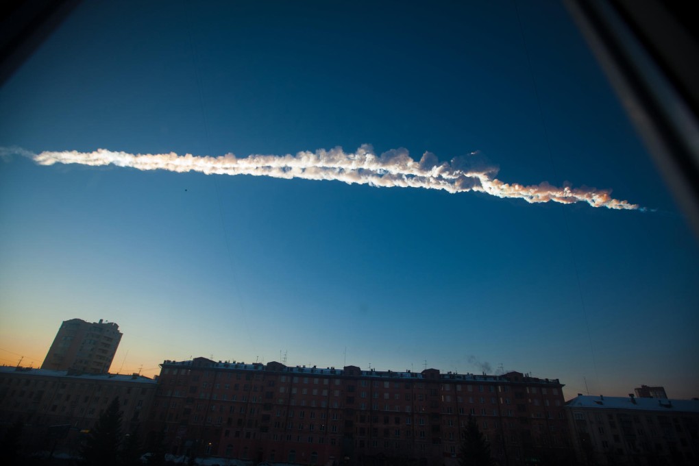 The trail of the asteroid above the city of Chelyabinsk. Photo: AP