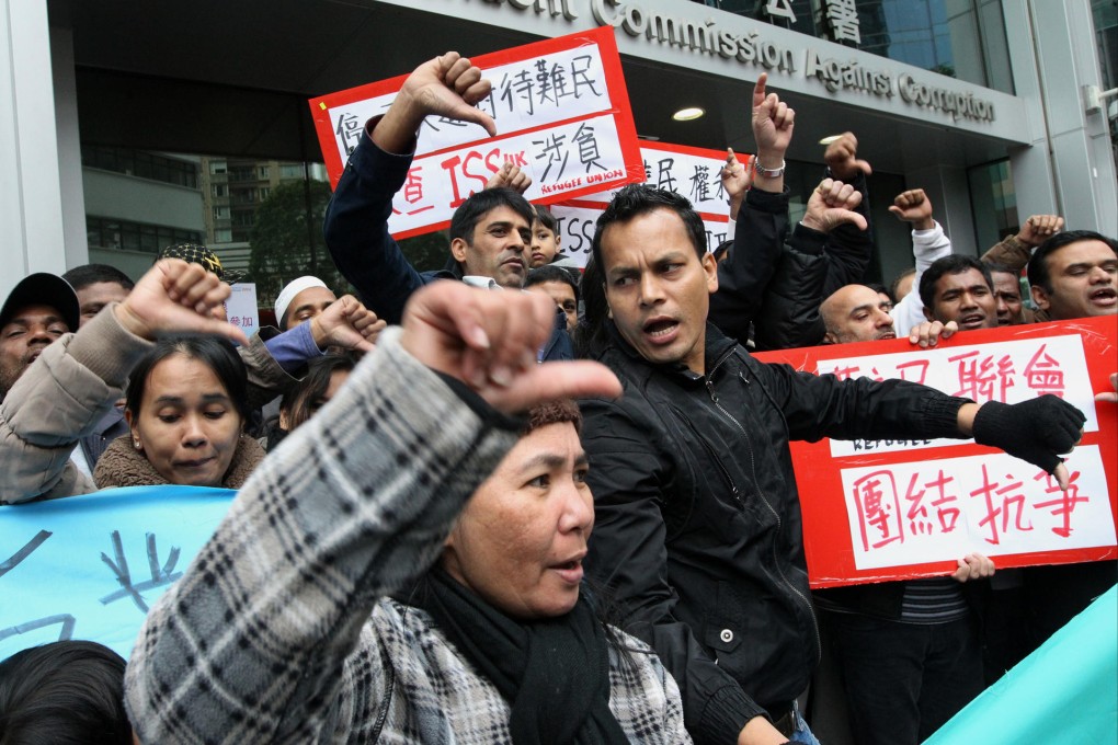 Refugees protest outside the ICAC headquarters. Photo: Felix Wong